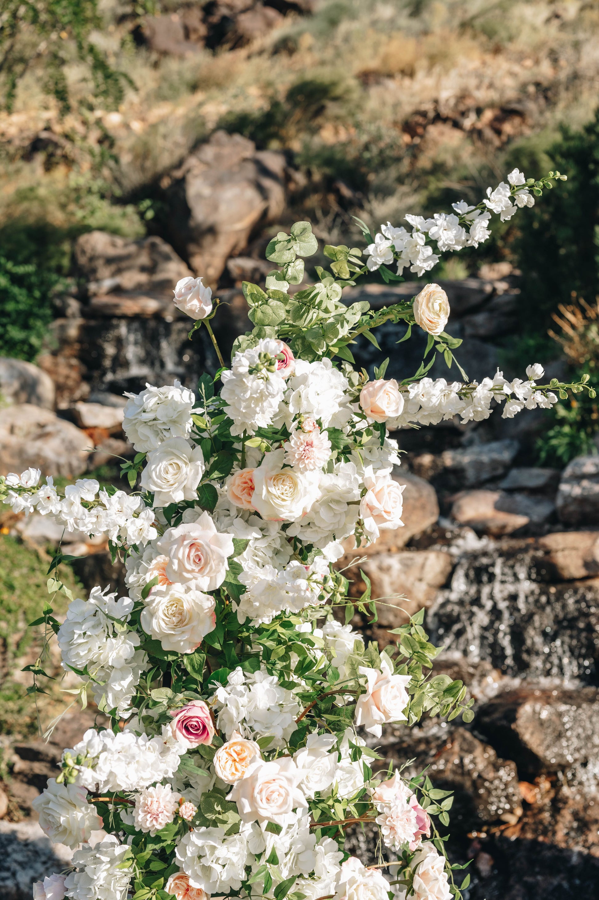 Blush pink wedding flowers at a wedding venue