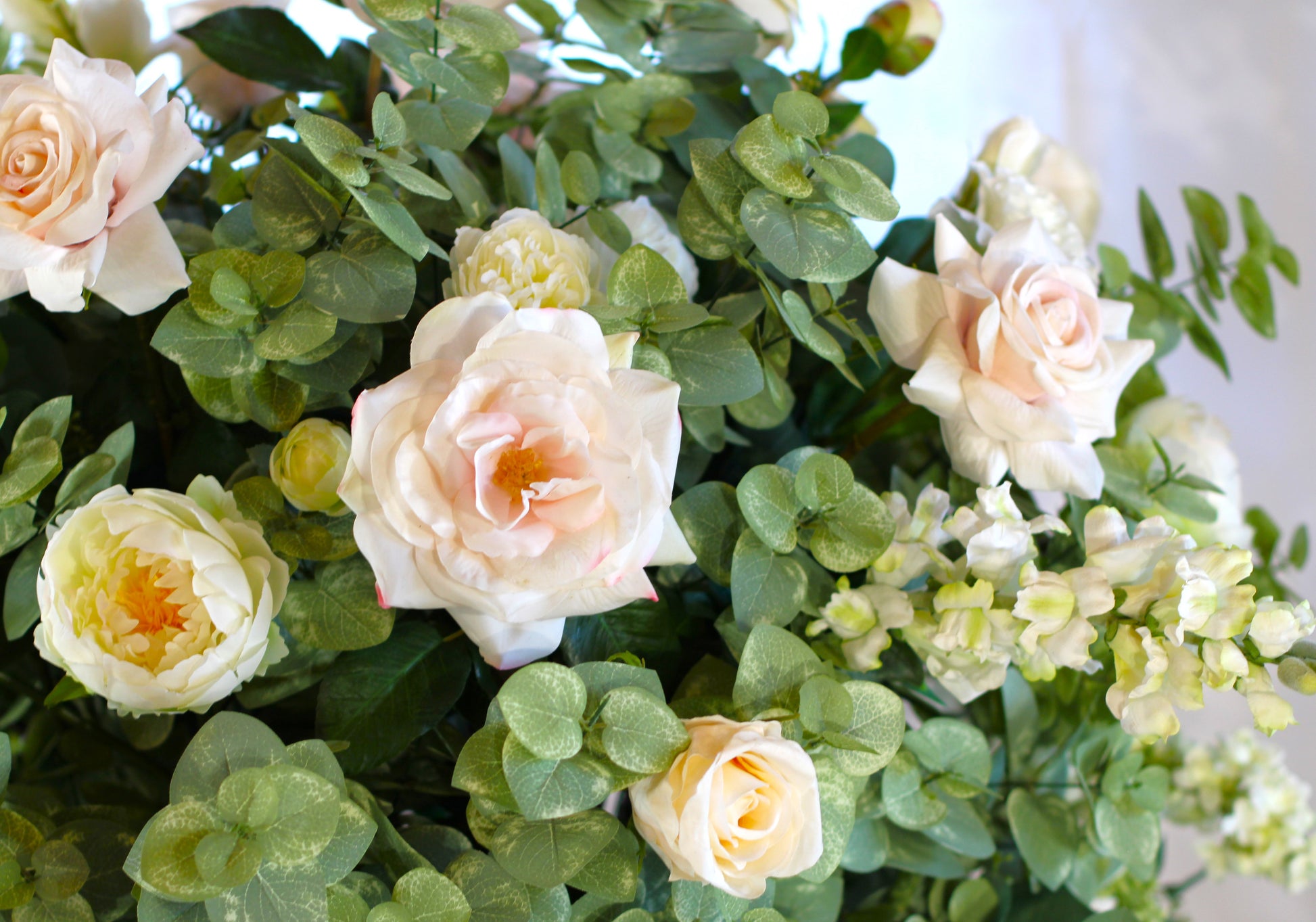 flower urn filled with greenery and blush pink flowers for rent in Las Vegas Nevada